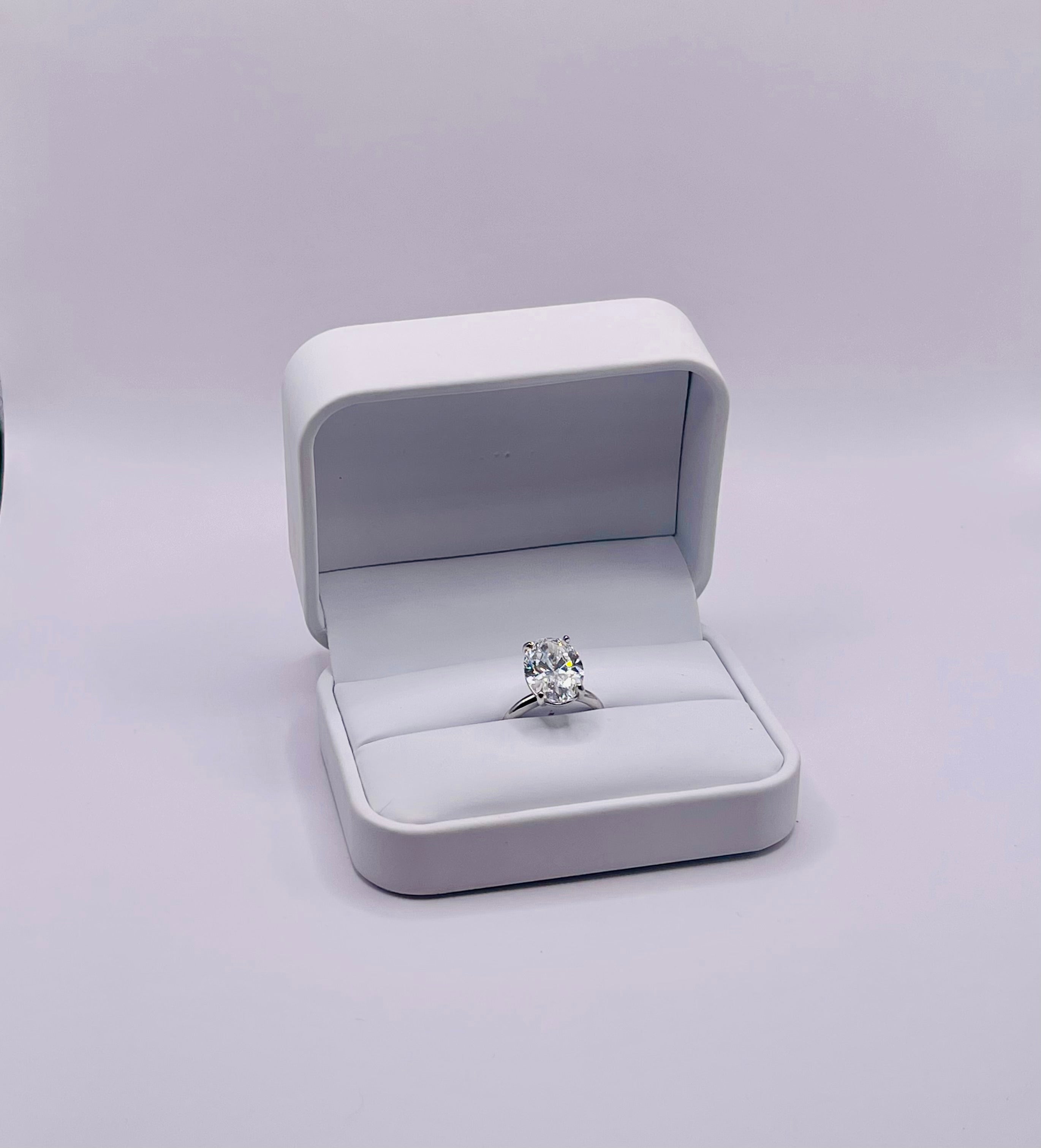 ROSÉ OVAL CUT SOLITAIRE LAB DIAMOND ENGAGEMENT RING