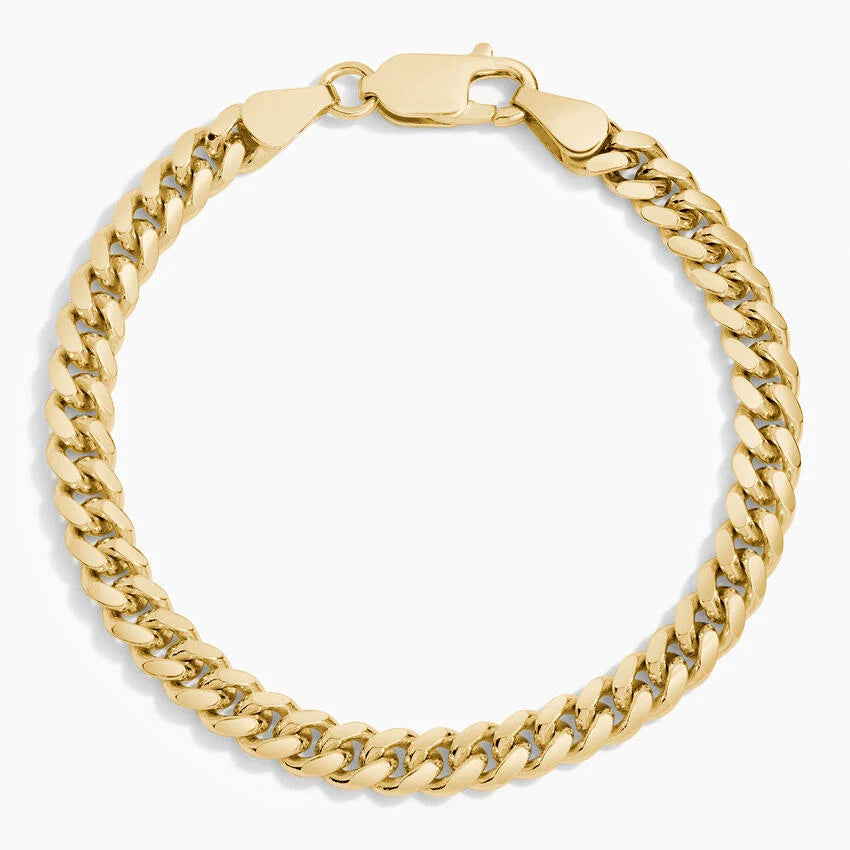 14K solid yellow gold men's Cuban link bracelet on white background